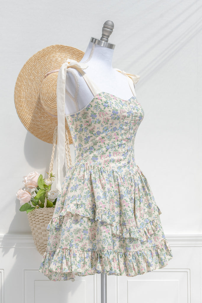 mini cottagecore floral dress - a cute mini dress with blue, pink, and green floral pattern. front view. amantine. 
