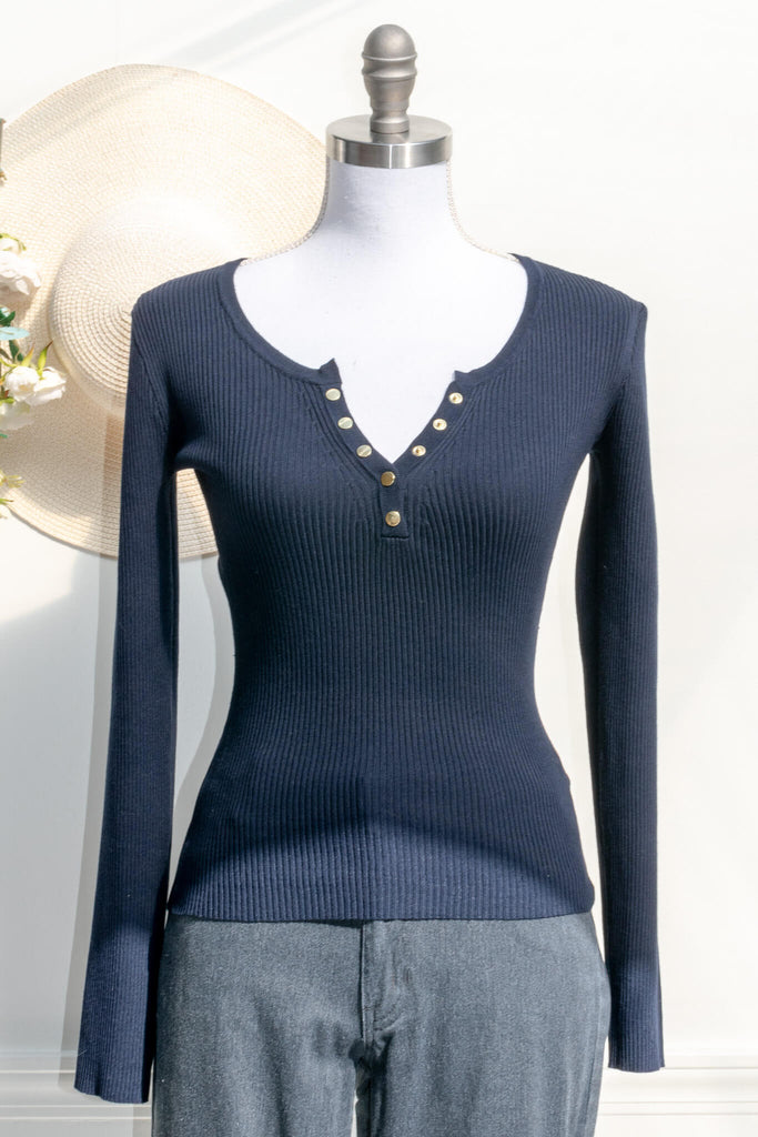 cute tops - blue ribbed feminine top. v neck, long sleeve. front view. 