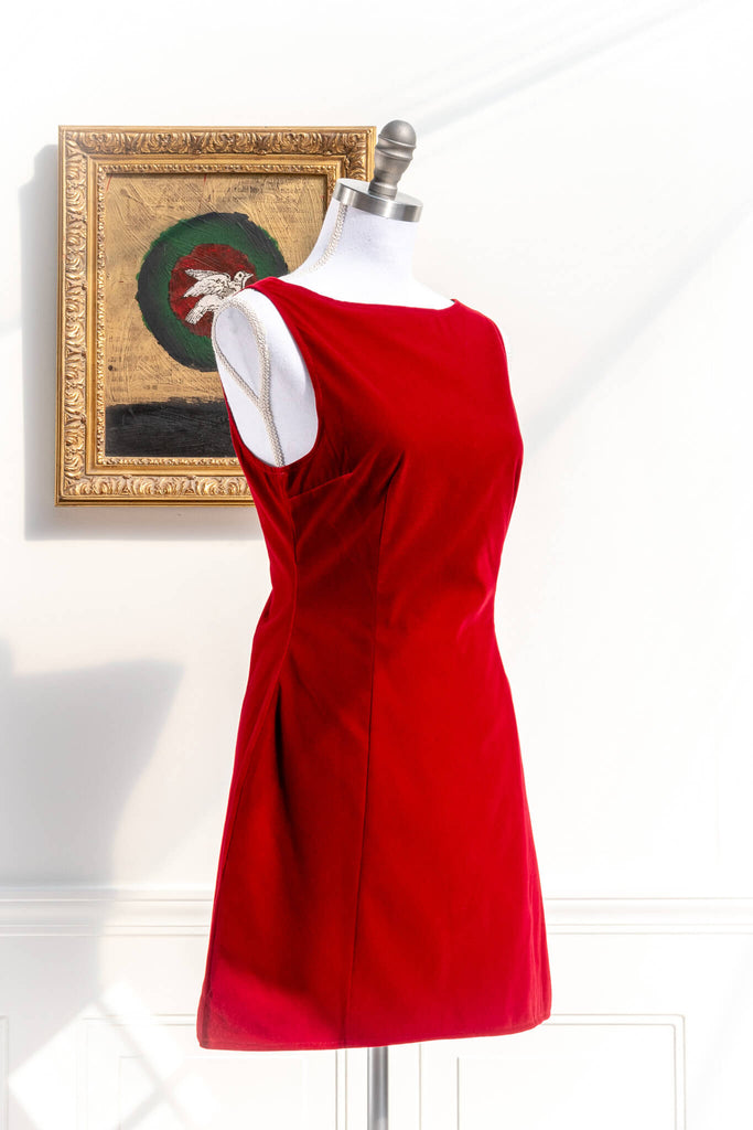 velvet dress for the holidays. red velvet mini dress french girl style form the 1960's. Cute holiday dresses. 3/4 side view. 