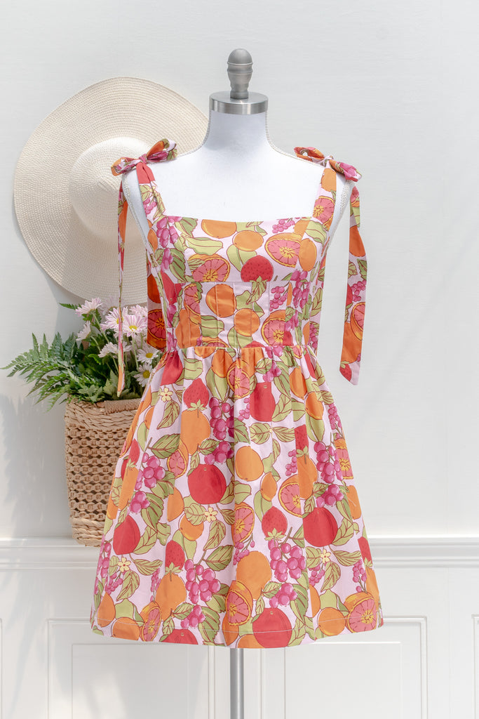 feminine parisian style mini floral dress. perfect for your summer adventures. front view. 