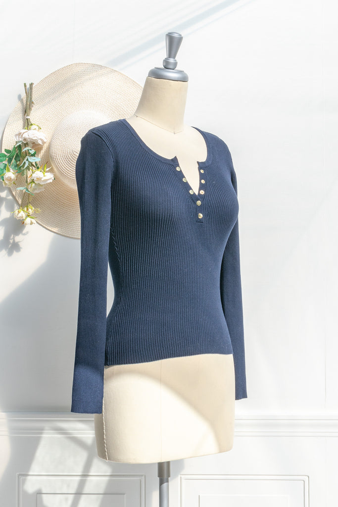 cute tops - blue ribbed feminine top. v neck, long sleeve. side view. 