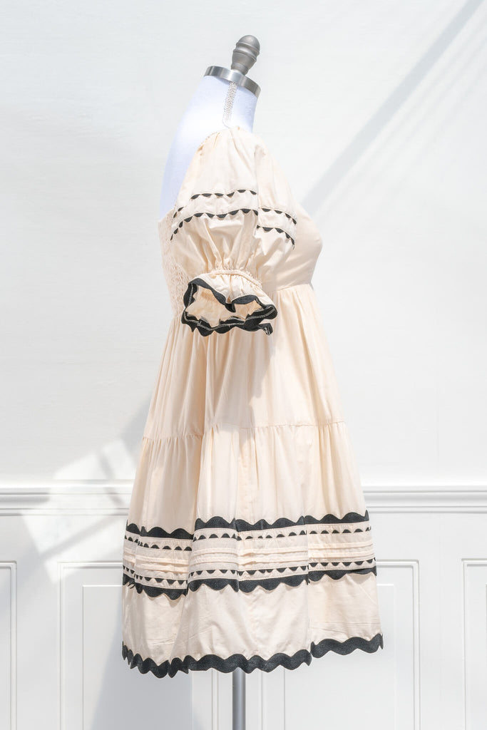 feminine cottagecore dress - a mini dress unique in style. side  view. amantine. 