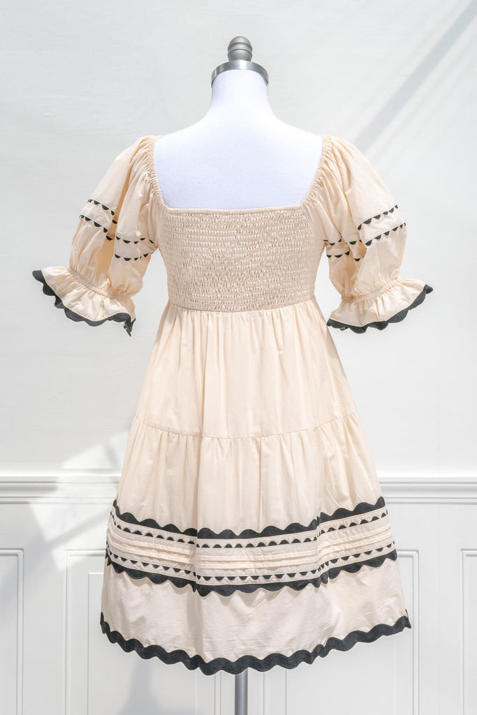 feminine cottagecore dress - a mini dress unique in style. back  view. amantine. 