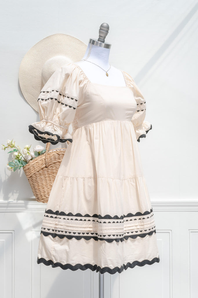 feminine cottagecore dress - a mini dress unique in style. quarter side  view. amantine. 