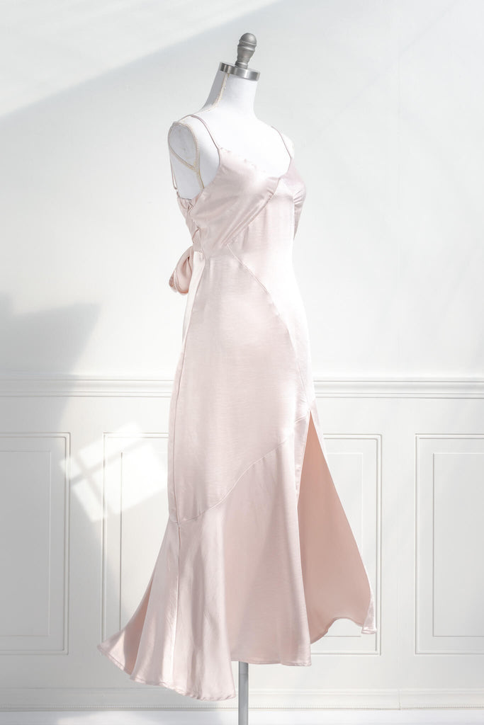 peach fuzz dress in a feminine and french style. Pink elegant dress - french girl style- amantine  side slit view view. 