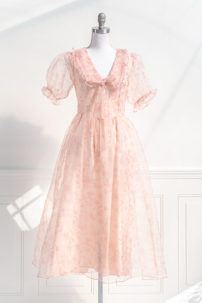 peach fuzz dress - pink aesthetic collection - a dress in peach fuzz with puff sleeves, sailor's collar, and feminine details. amantine. front view. 