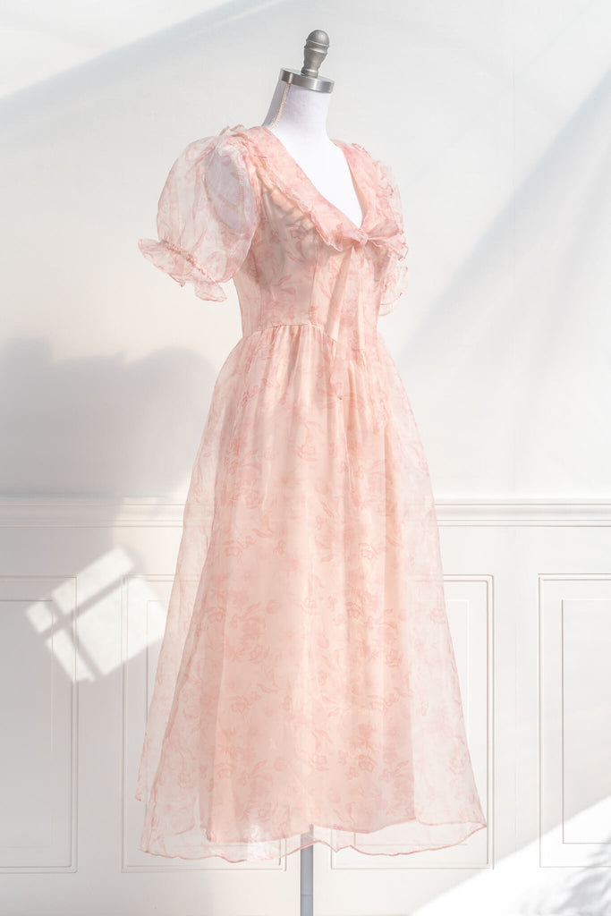 peach fuzz dress - pink aesthetic collection - a dress in peach fuzz with puff sleeves, sailor's collar, and feminine details. amantine. quarter view. 