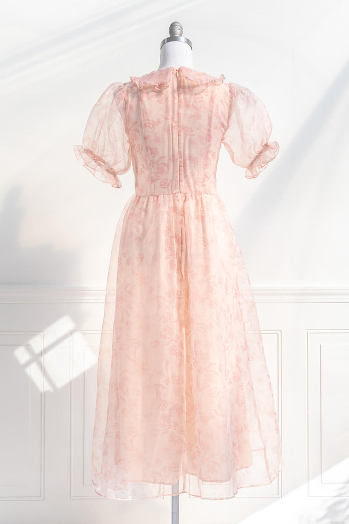 peach fuzz dress - pink aesthetic collection - a dress in peach fuzz with puff sleeves, sailor's collar, and feminine details. amantine. back view. 