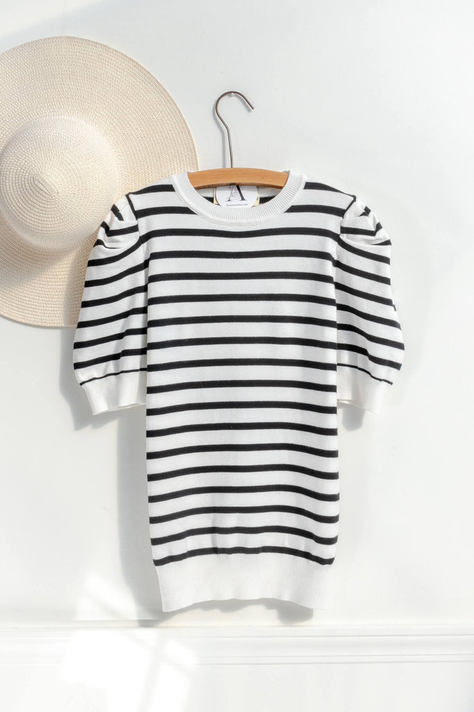 French striped top - feminine, and romantic classic french clothing. black and white pattern. on hanger view. 