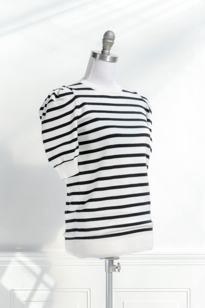 French striped top - feminine, and romantic classic french clothing. black and white pattern. quarter view. 