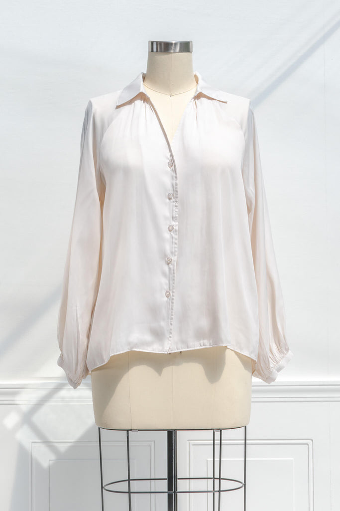 feminine blouses for work - a work appropriate beige button down dress shirt. Front view. 