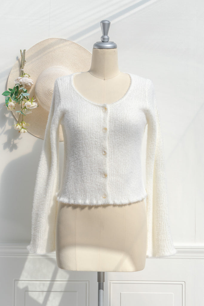 cute tops -cream colored eyelash cardigan features a v-neckline, long sleeves, and a cropped length. front view. 