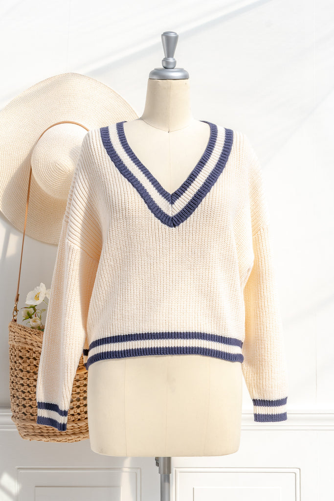 light academia college classic sweater, cream, v neckline, long sleeves. front view. amantine.