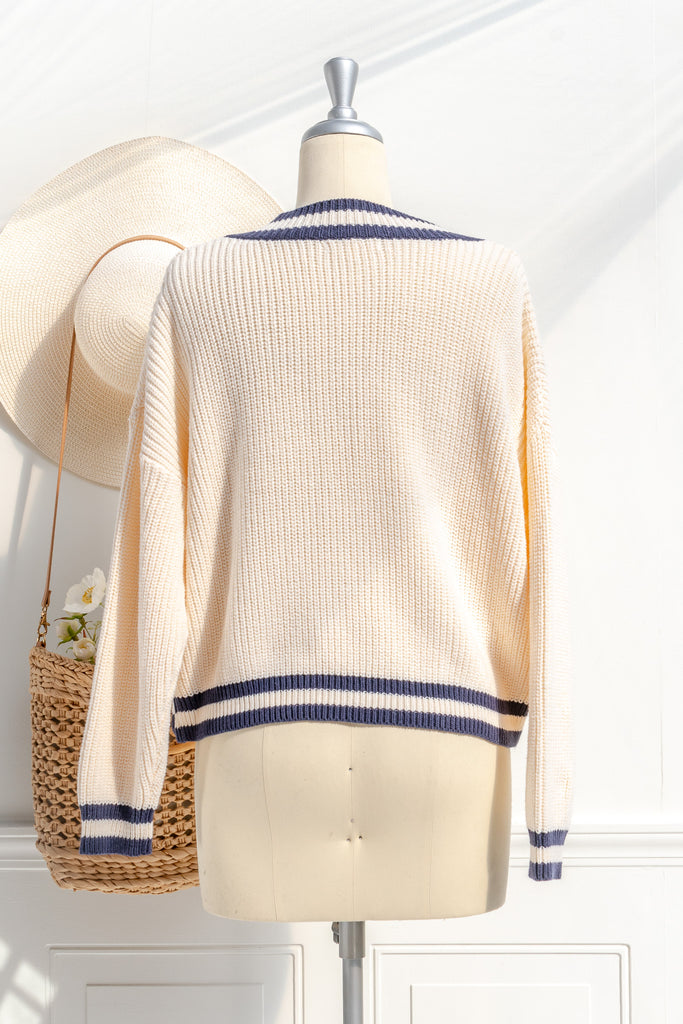 light academia college classic sweater, cream, v neckline, long sleeves. back view. amantine.