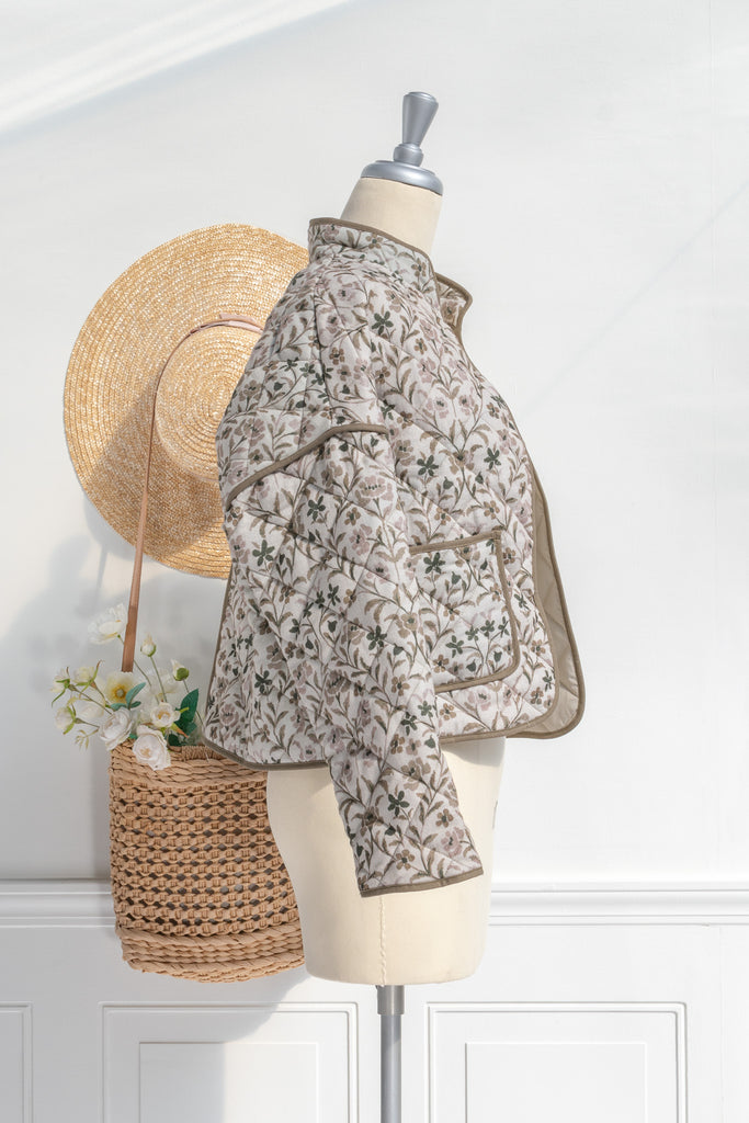 Feminine clothing - a beautiful light weight quilted floral jacket with pockets, dropped shoulders, and a very feminine style. Perfect for spring. side view. Amantine.  