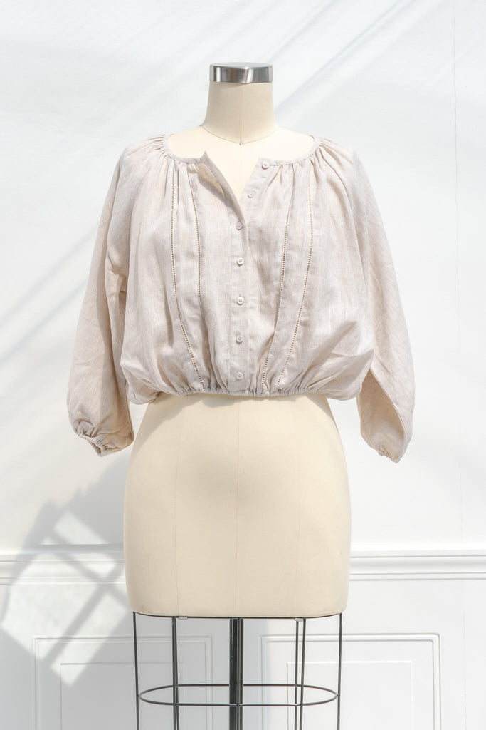 cottagecore outfits - a french and feminine style linen top for work. Button down, long sleeves, round neckline. Front view opened front. 