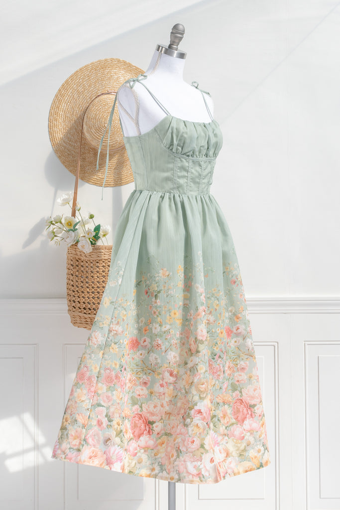 Floral outfit. A beautiful cottagecore floral dress outfit with a light green top and a floral bottom. Perfect for parties, or just to romanticize. 3/4 view. amantine.  