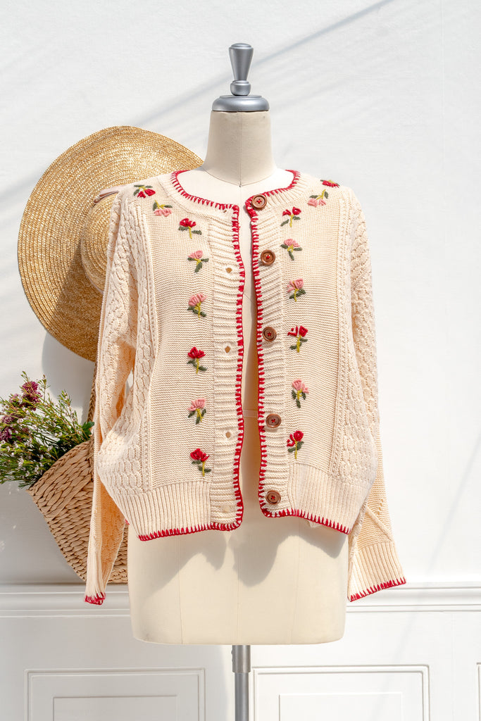 floral-embroidered cardigan in cream with red contrast trim and button front — front view
