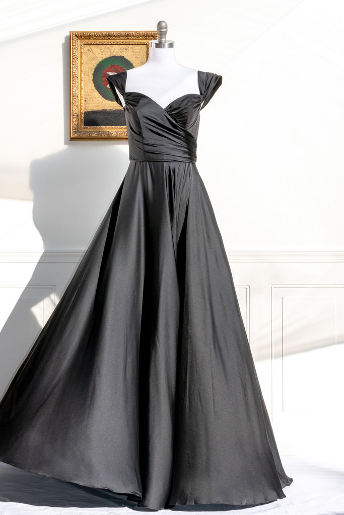 long black formal gown with structured bodice and wide skirt. a line. off the shoulder. feminine french style. 