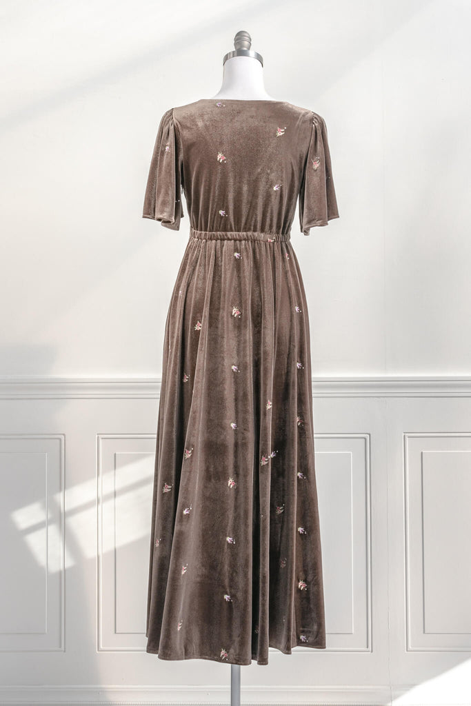 a french and cottage core inspired dress - mocca color velvet with cotton lacing detail and small embroidered flowers all throughout. back view - amantine.  