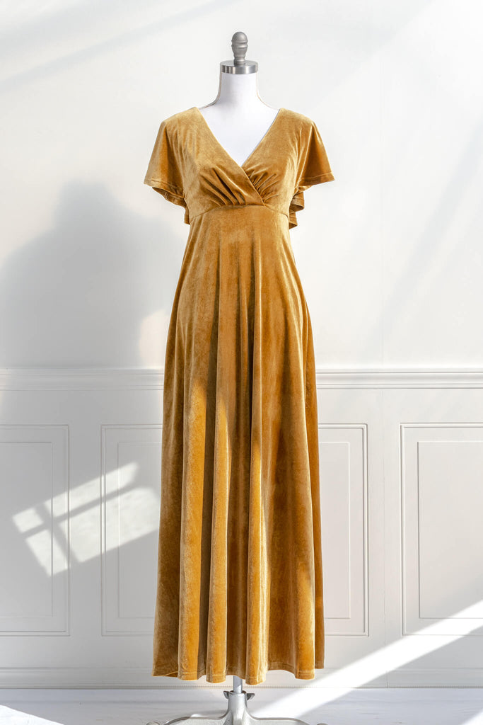 long yellow mustard velvet holiday dress - featuring a feminine cottage core silhouette, v neckline, short sleeves, and long skirt. front view - amantine.