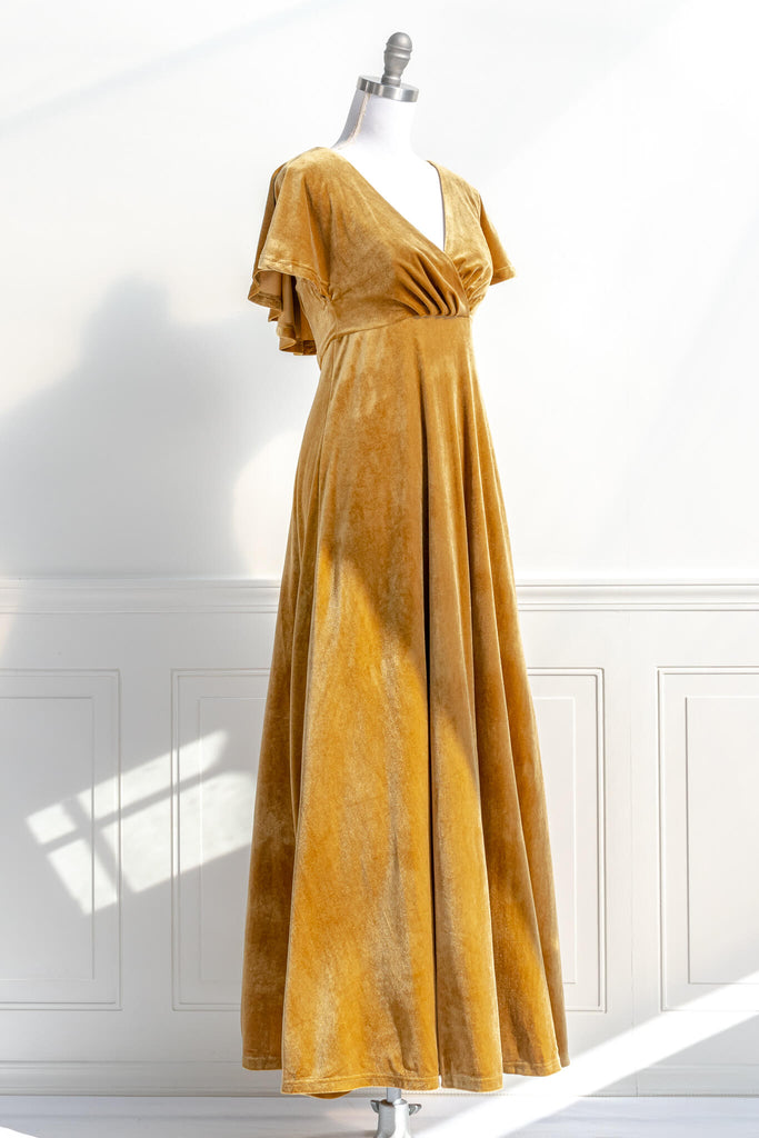 long yellow mustard velvet holiday dress - featuring a feminine cottage core silhouette, v neckline, short sleeves, and long skirt. quarter view - amantine.