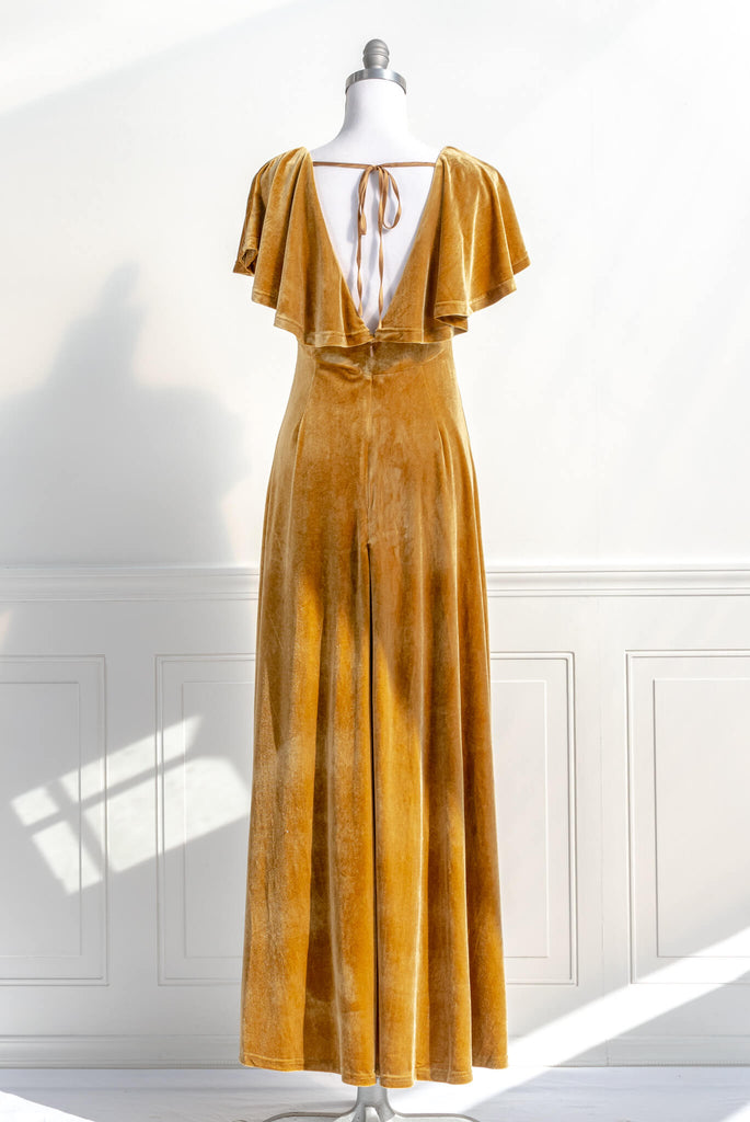 long yellow mustard velvet holiday dress - featuring a feminine cottage core silhouette, v neckline, short sleeves, and long skirt. back view - amantine.