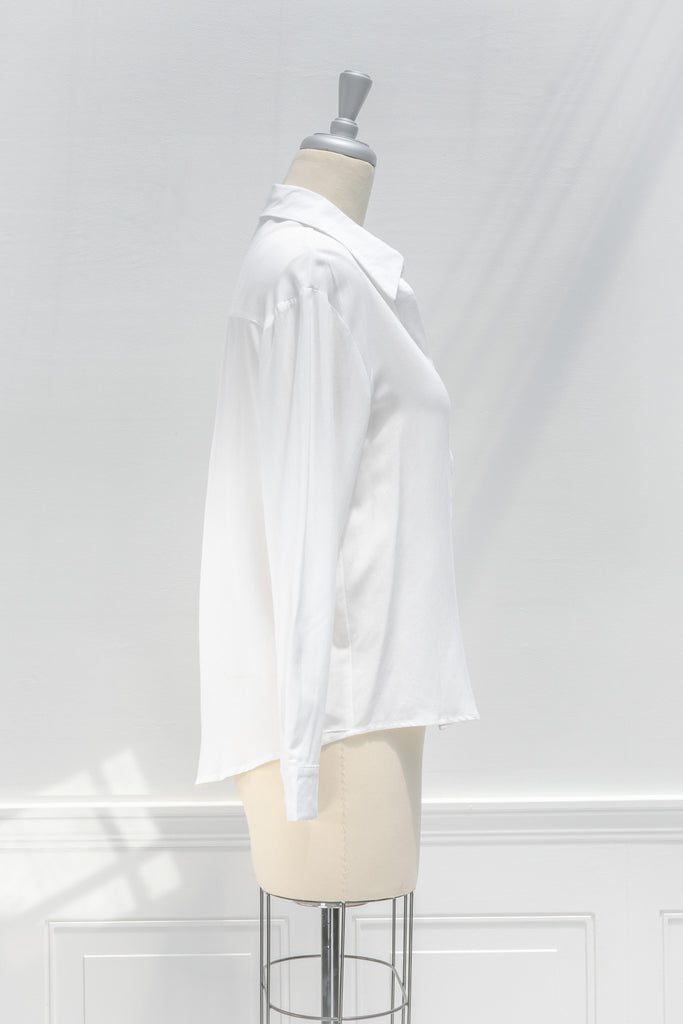 cute french style white button down shirt. front view.