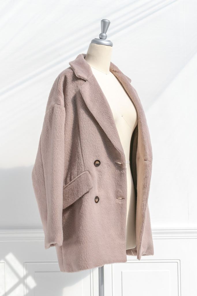 french style winter coat - feminine french girl style double breast camel coat. side view. 