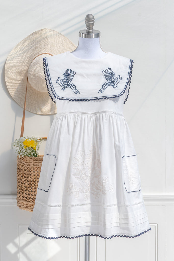 french dress with a cottagecore twist. lwd with sailor collar and bird detail. feminine and romantic french dress. view. 