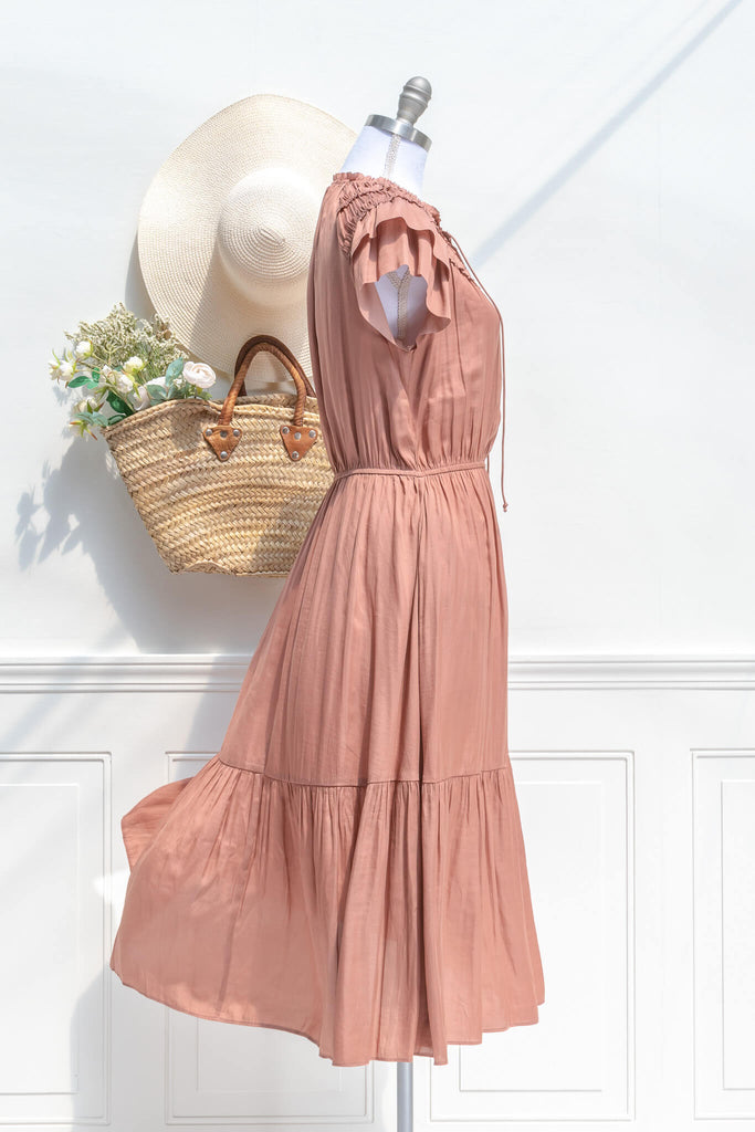 french dresses in feminine style - an orange ruffled midi dress. view. 