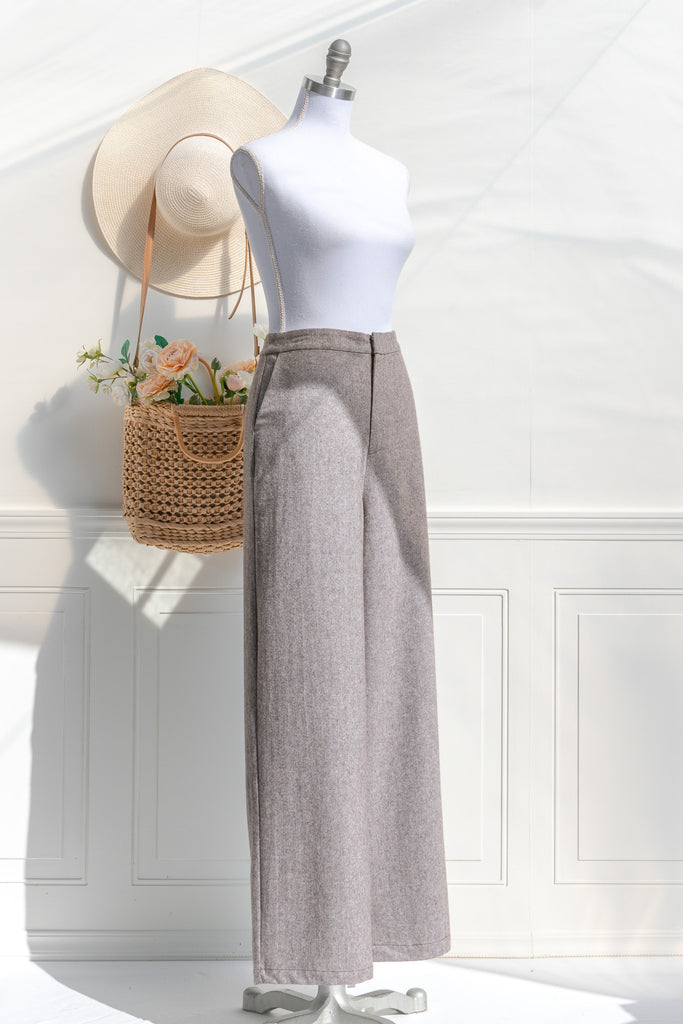 french girl style trousers. wide leg taupe pants with pockets. front view. 