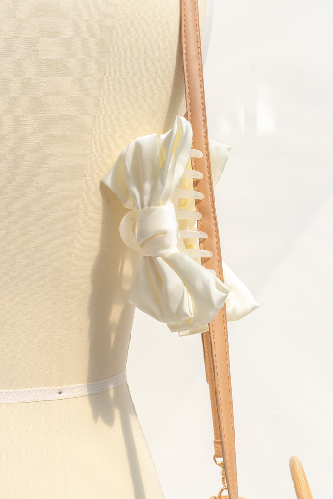 french hair accessories - a 4 inch cream satin bow with claw clip. feminine french style. 