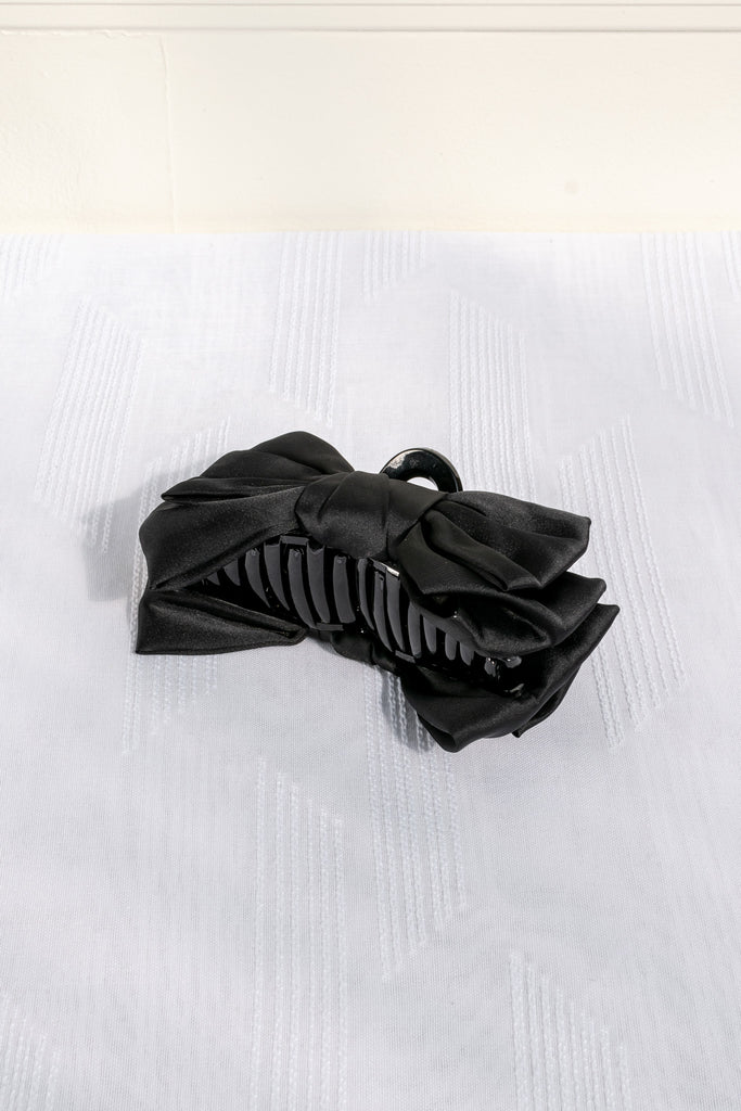 french hair accessories - a 4 inch black satin bow with claw clip. feminine french style. 