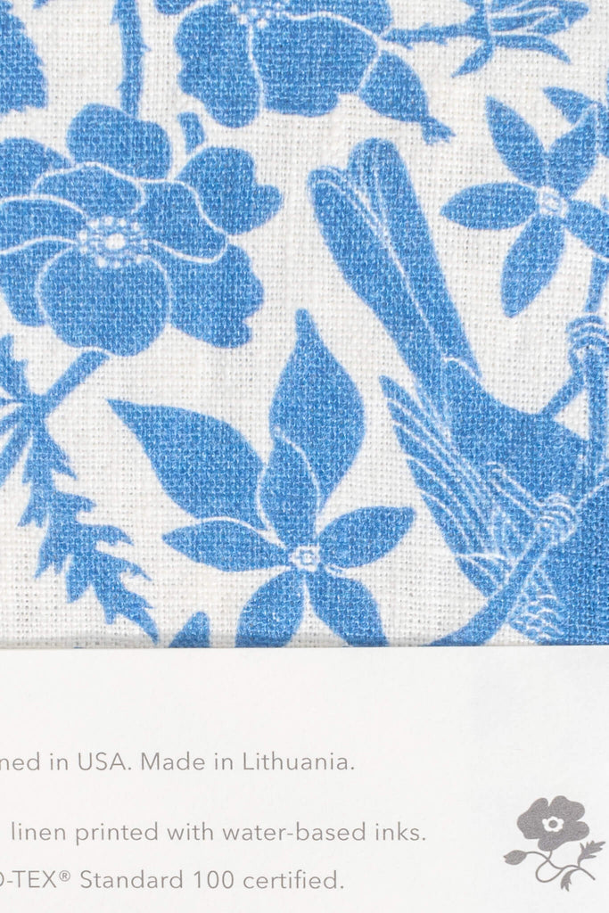 a french kitchen essential - a linen tea towel with a blue bird print motif. the perfect gift for the francophile in your life. 