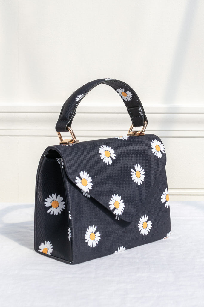 cute french bag with floral daisy details. 