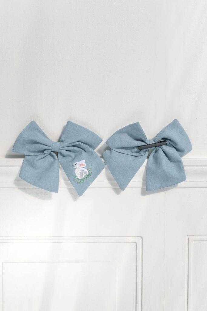 french girl hair accessories. a blue clip bow with a pretty bunny / rabbit embroidered detail. amantine