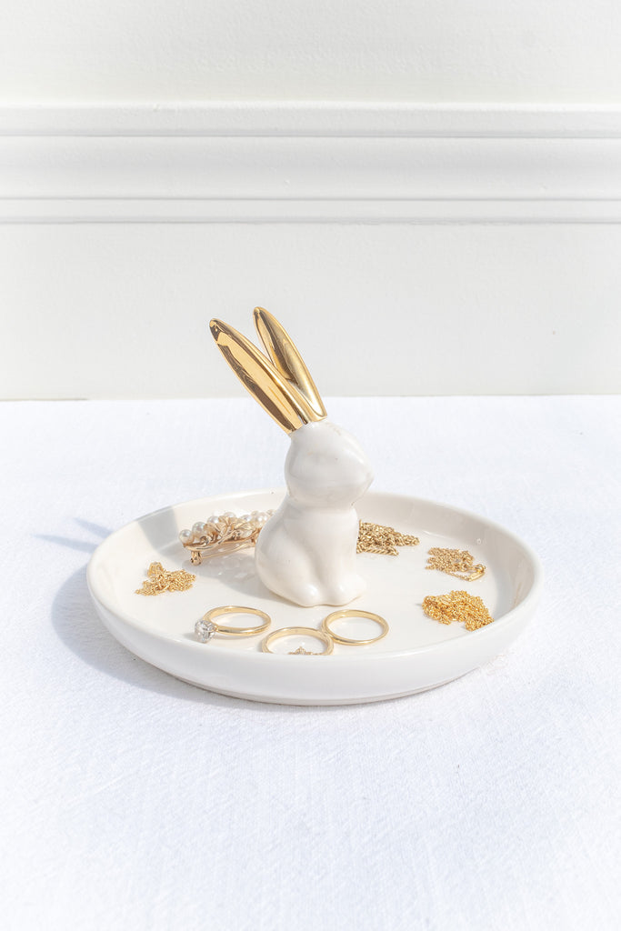 a cute ceramic jewelry dish with a white rabbit. perfect gift for the francophile in your life. 