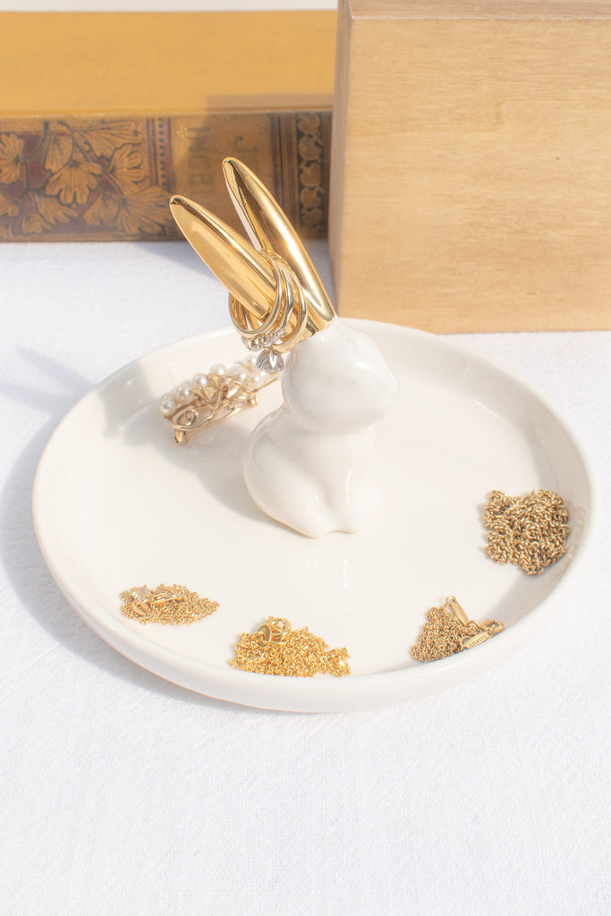 a cute ceramic jewelry dish with a white rabbit. perfect gift for the francophile in your life. 