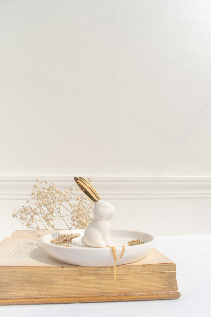 a cute ceramic jewelry dish with a white rabbit. perfect gift for the francophile in your life. 