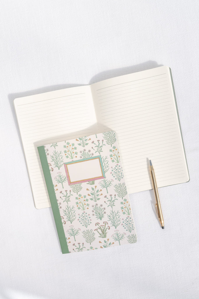 small gifts for people who love france. a small notebook with floral cover margin. 