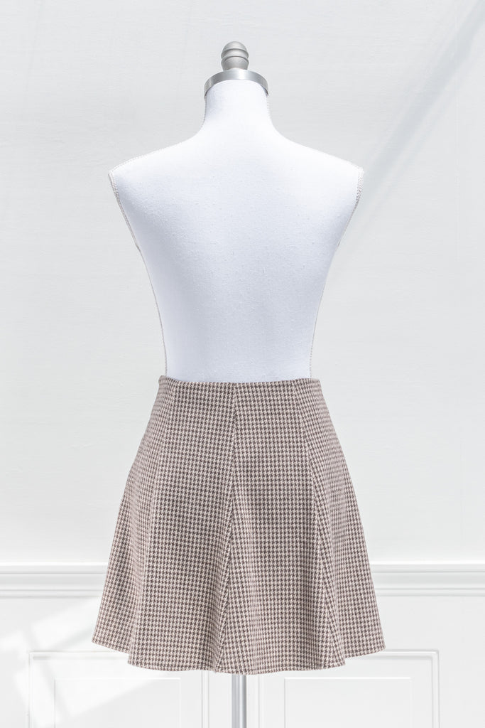 a cute brown plaid mini box pleated skirt. back view. 