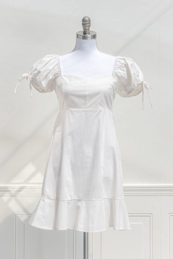 graduation dress - a lwd perfect for graduation, mini dress, puff sleeves, cottagecore style. front view 2.