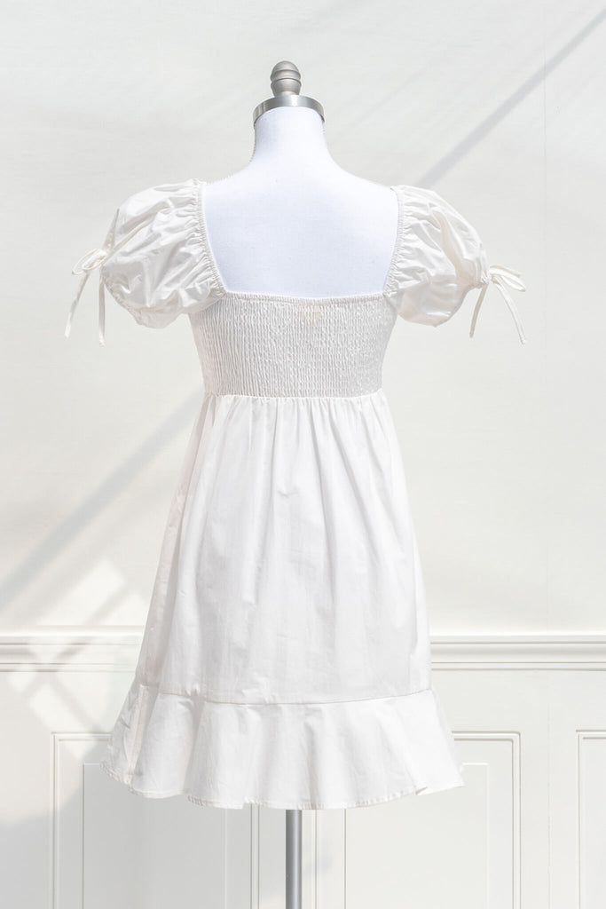 graduation dress - a lwd perfect for graduation, mini dress, puff sleeves, cottagecore style. back view. 