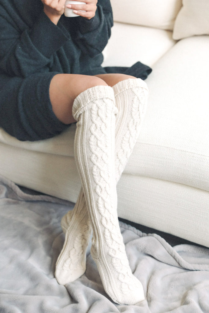 cream cable knit long socks for cozy winter.