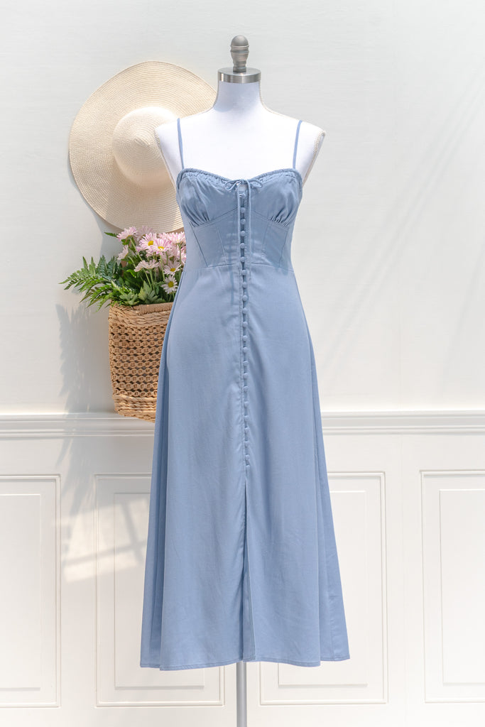 summer parisian style dress - blue linen dress. button down, sweetheart neckline, spaghetti straps. perfect for a trip to the farmer's market or a perfect dress for the beach. front view. 