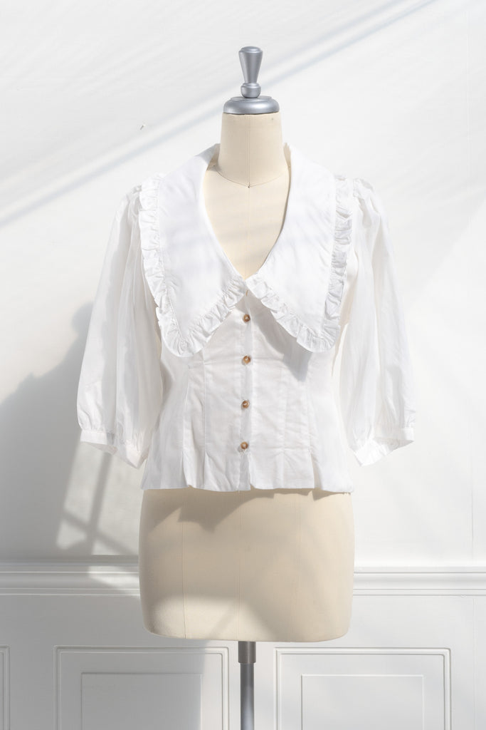 peter pan collar white blouse. french girl style basic with a cottagecore twist. front view. 