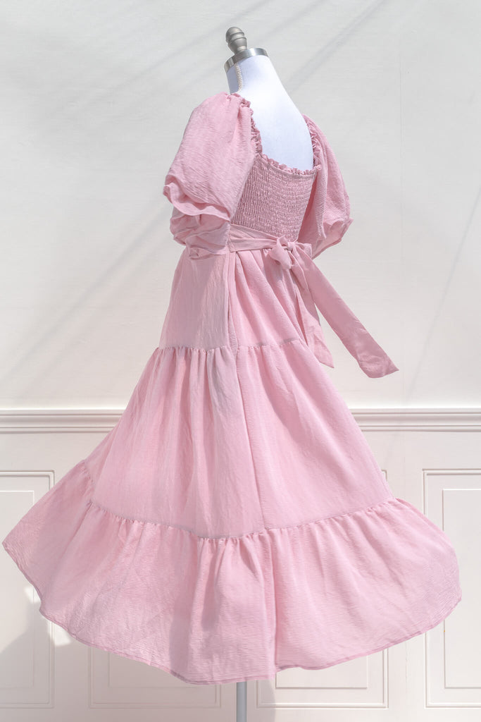 pink dresses - a beautiful cottagecore style pink midi dress with puff sleeves and back bow tie. feminine pink dresses amantine. spinning mannequin view. 