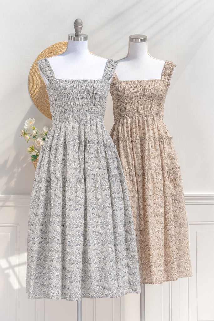 pretty dresses for spring. a romantic, vintage-inspired piece featuring a delicate floral print on a soft, blue and white floral 100% cotton. side view. amantine. 