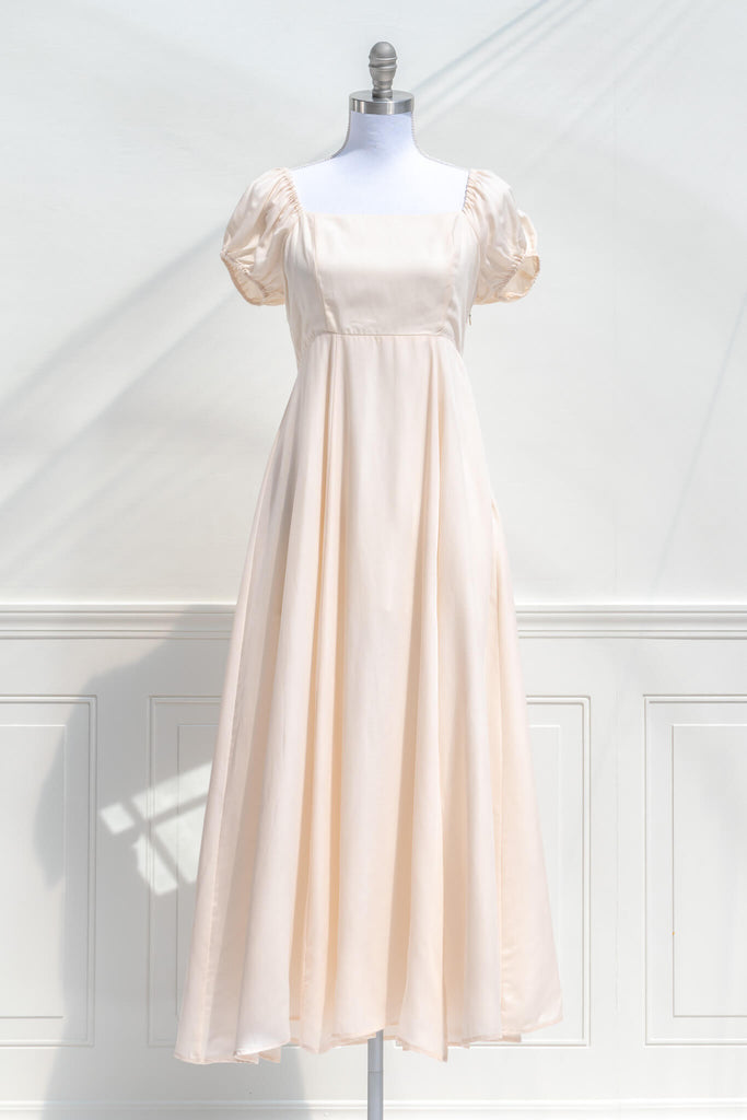 feminine cottagecore dress in cream color. front view. 